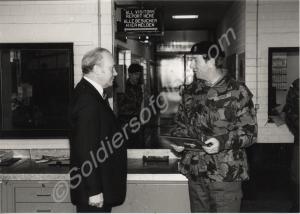 Brigadier Oliver presenting Corporal Carlisle with