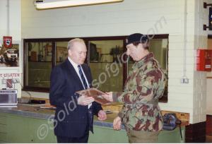 Brigadier Oliver presenting Corporal Carlisle with