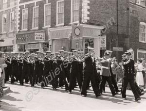 The crew of H.M.S. Gloucester parading through the