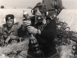 Duke of Gloucester assisting the Mortar Platoon of