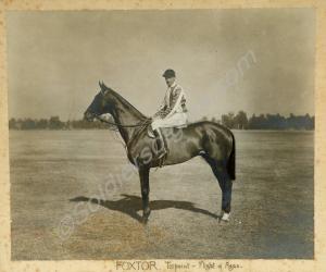 Lieutenant-Colonel J.R. Guild in racing silks on h