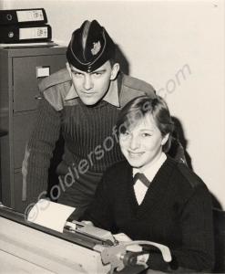 "New look in the Orderly Room." Private Annie Burm