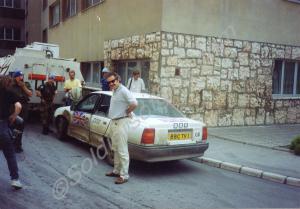 Jeremy Bowen of the B.B.C. with car at P.T. Buildi