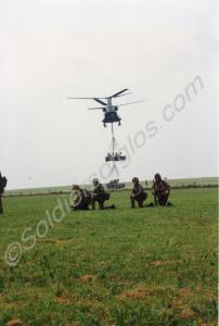 A Chinook helicopter lifting A.T.M.P., plus load,