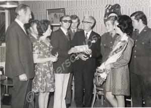 Mr. South presenting a cheque to Mr. Ray Peart for