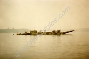 Soldiers on an assault pontoon barge. 1st Battalio