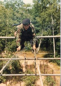 Soldier tackling an assault course. 1st Battalion,