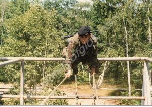 Soldier tackling an assault course. 1st Battalion,