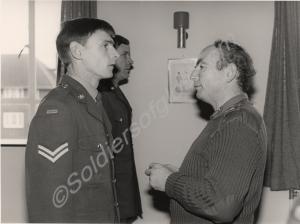 Corporal Deacon receiving medal from 'G.O.C.'. 1st