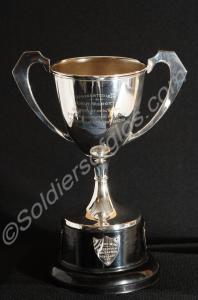 Silver plated Cup with two handles and plinth. Fou