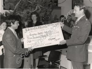 Presentation of Christmas gift of cheque for Â£3,0