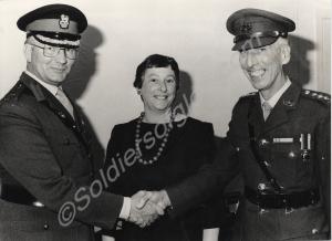 Captain Norman Tuggey receiving his Cadet Forces M