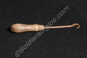 Metal button hook with wooden handle, approx. 4 in