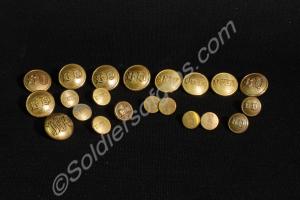 21 various uniform buttons.