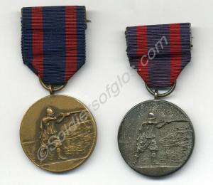 Two medals from the Society of Miniature Rifle Clu