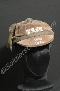 Faded school Rugby Cap with tassle and band in sil