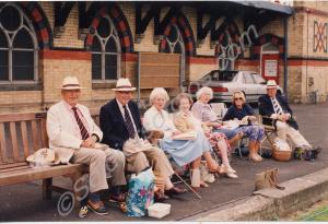 Veteran spectators watching a a cricket match at C