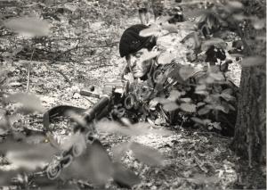 Camouflaged soldier with GPMG. Gloucestershire Reg