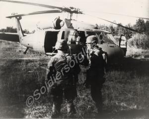 American soldiers with Black Hawk helicopter. c. 1