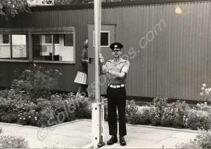 Lance Corporal Capel securing the flag. Gloucester