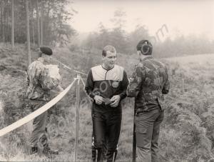 Sergeant A. Risbey orienteering in tracksuit. Glou