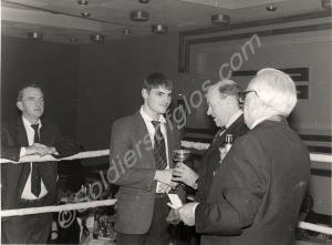 General Sir Anthony Farrar-Hockley presenting a cu