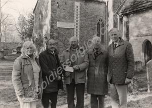 Colour Sergeant Godden's father handing over a che