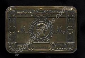 Brass gift box for troops with a card from Queen M