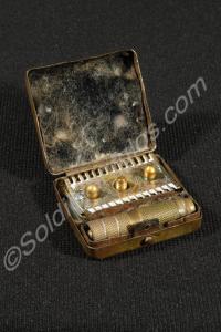Complete folding razor with brass box. Belonged to