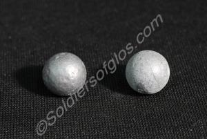 Two modern lead .75 musket balls.