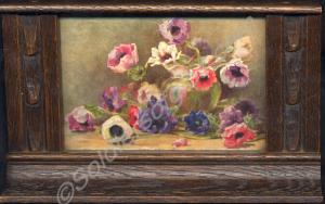 Postcard mounted in oak frame, decorated with flow