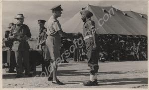 Major-General L. H. Cox awarding prizes to Indian