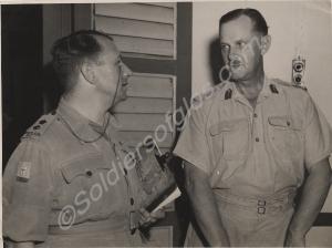 Major-General L. H. Cox talking to Roman Catholic
