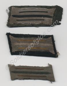 Items of German Wehrmacht uniform insignia. Three