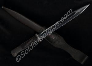 German bayonet in scabbard and with leather frog.