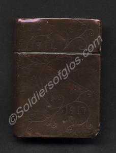 Copper-cased cigarette lighter decorated and inscr