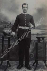 Studio portrait of  a soldier  in walking out dres