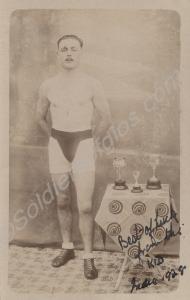 Boxer with trophy. India, 1928. 1st Battalion, The