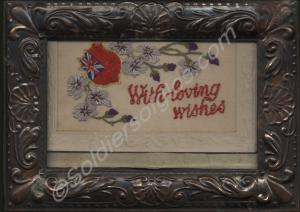 Silk embroidered postcard in copper frame. "With L