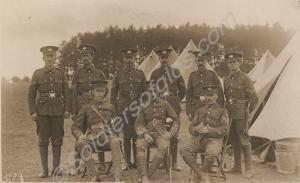 Group of soldiers in camp. 6th Battalion, The Glou
