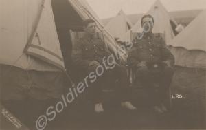 Two soldiers on deckchairs in camp. 6th Battalion,