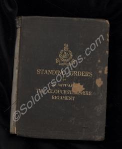 Three books with bookmark and photographs. 1) "Sta