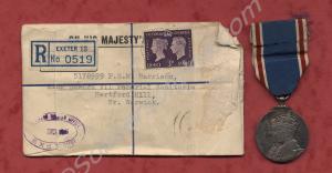 George VI Coronation Medal in envelope. Sent to Pl