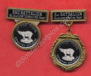 Two identical badges on different mounts belonging