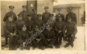 Officer and sergeants in the snow. Includes men f