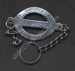 Name tag in white metal for L. J. Coward. France,