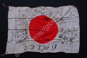 Japanese flag with good luck writing on it. Taken