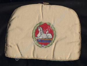 Tea-cosy embroidered with Sphinx and wreath design
