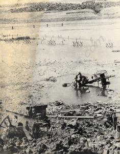 Wreckage of Chinese artillery at Gloster Crossing