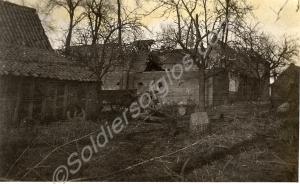 Damaged farm buildings. 1st Battalion, The Glouces